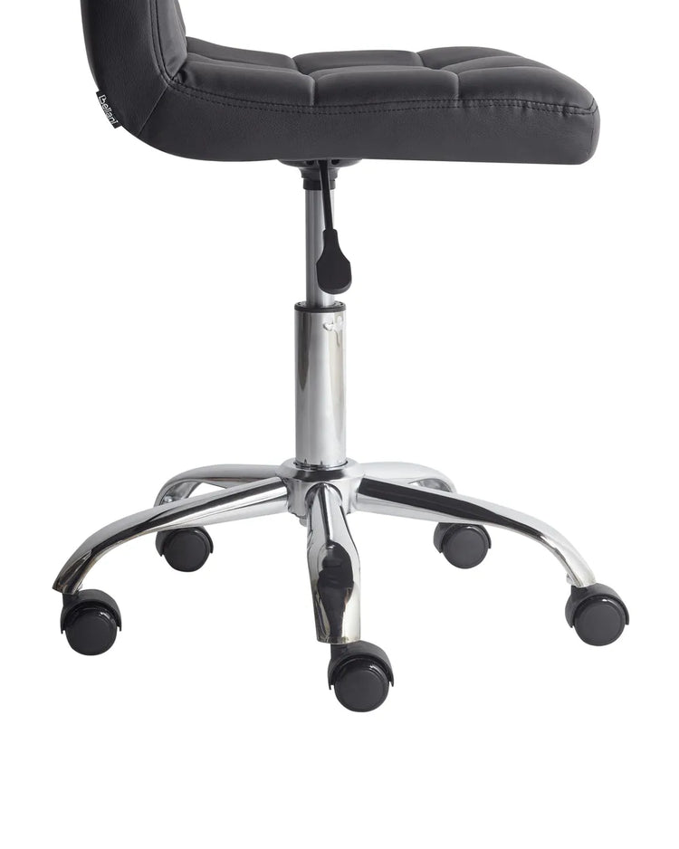 Modern black faux leather cushion desk chair with chrome base and five caster wheels, Bauhaus-inspired comfort.