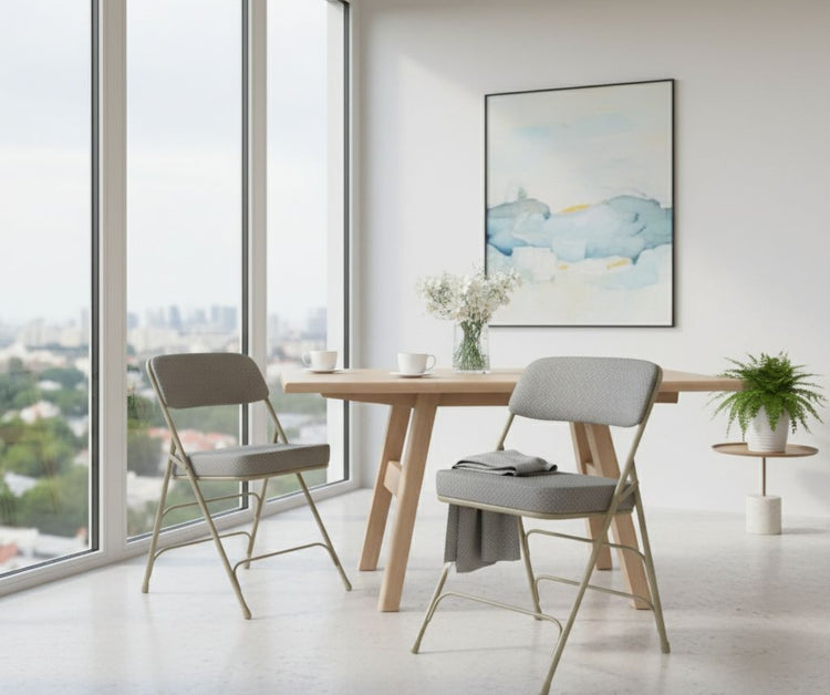 Modern dining area with a wooden table and gray chairs, featuring a large window with a cityscape view.