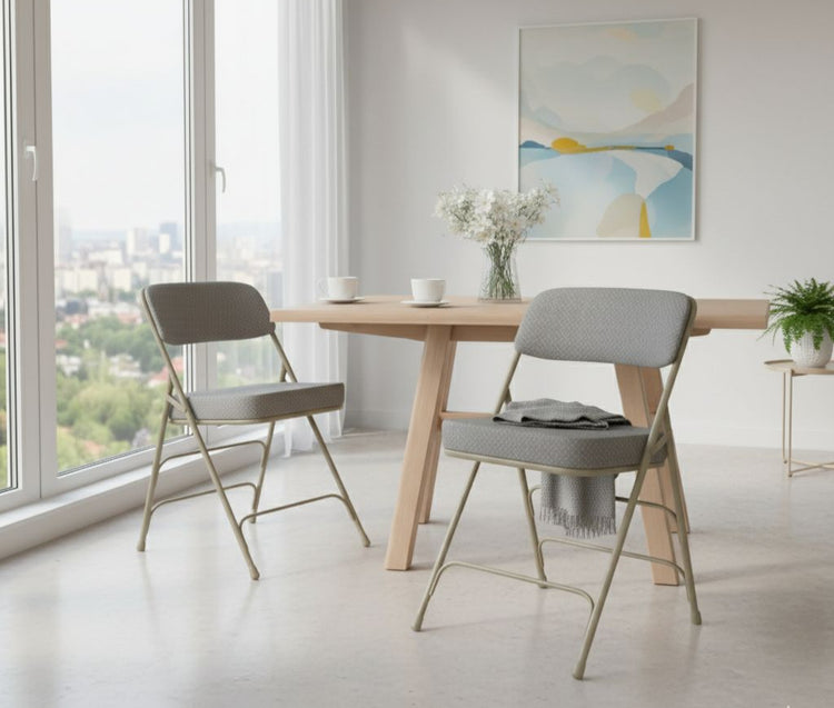 Modern dining room with wooden table and gray chairs near a large window.
