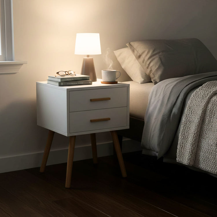 Modern white piano-finish two-drawer nightstand with compact footprint and angled wooden legs.