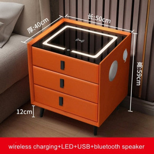 Orange bedside table with three drawers featuring Qi wireless charging, USB ports, and ambient LED night light.