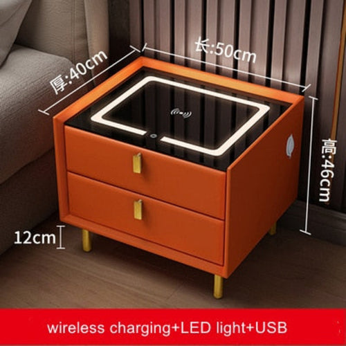 Orange smart bedside table with Qi wireless charging, USB ports, LED night light, and two drawers.
