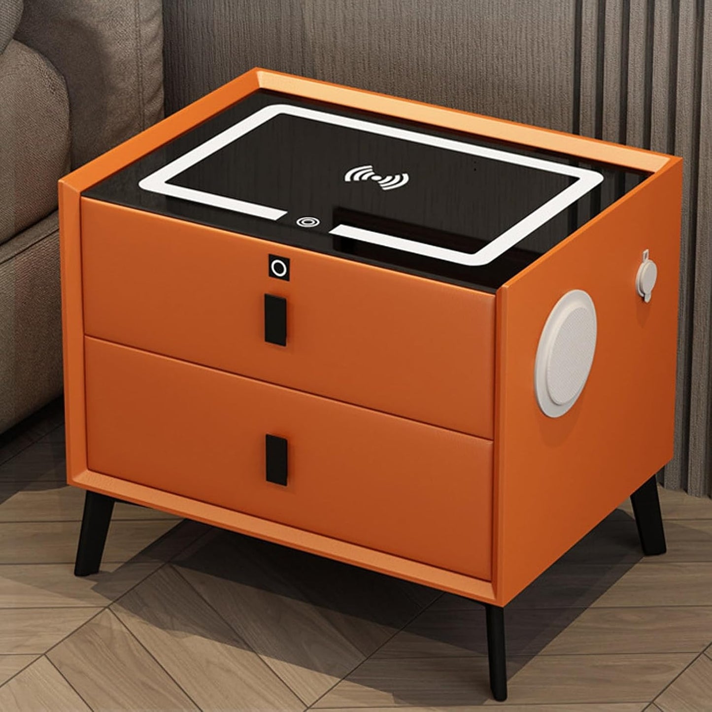 Orange smart bedside table with wireless charging top, USB ports, two drawers, and angled black legs.