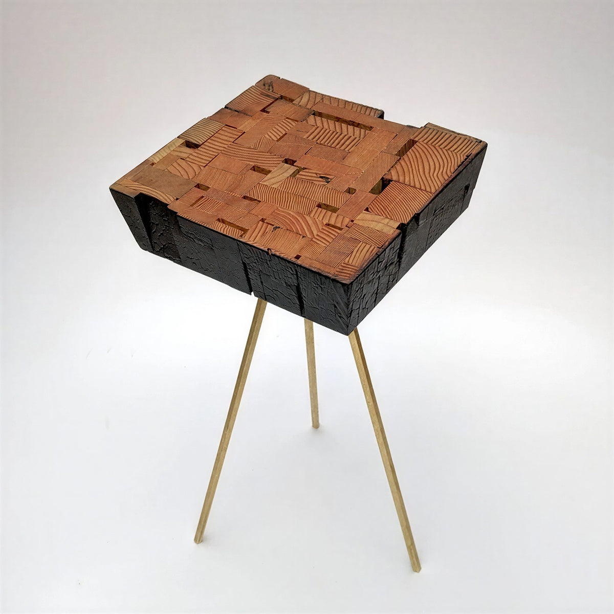 Reclaimed wood side table, charred sides and mosaic top, low angle (plain studio)