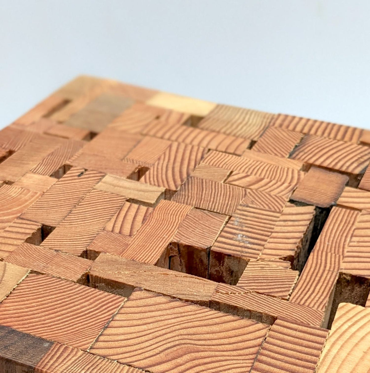 Close-up detail of the mosaic tabletop, salvaged offcuts joined edge to edge