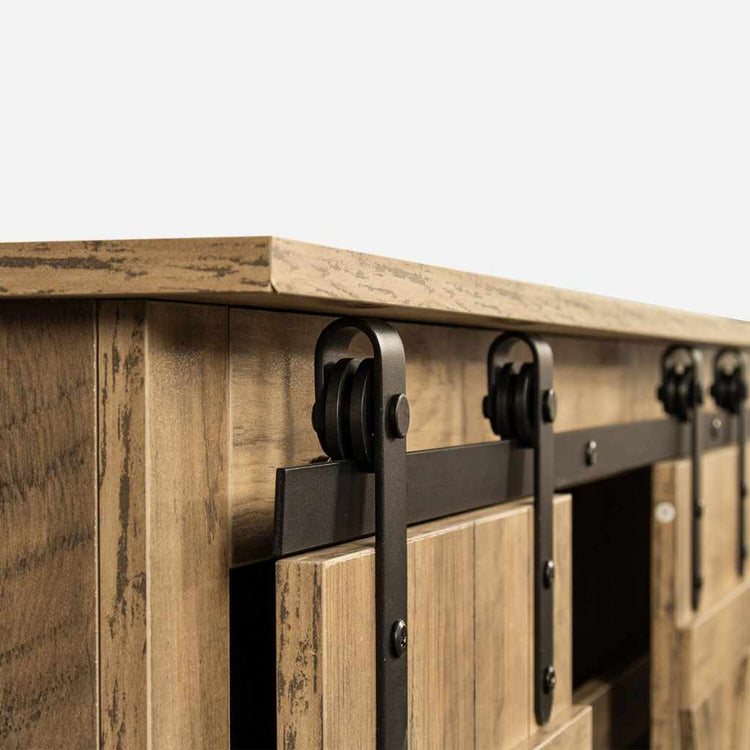Rustic walnut-finish TV stand with sliding barn door; close-up of black metal hardware.