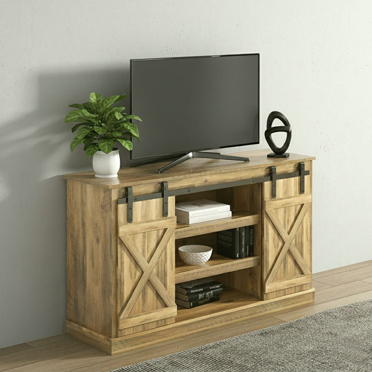 Rustic walnut-finish TV stand with sliding barn doors, open shelves, and a TV on top.