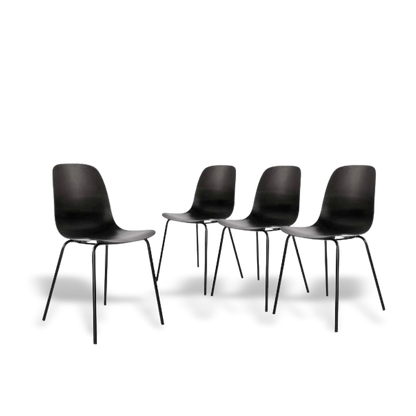 Matte black dining chair finish detail on a #f3f3f3 studio background