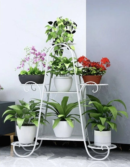 Six-tier white metal plant stand with potted plants, space-saving home decor