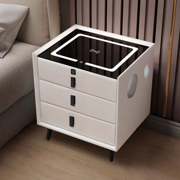 White two-drawer bedside table with glass top featuring a built-in Qi wireless charging pad.