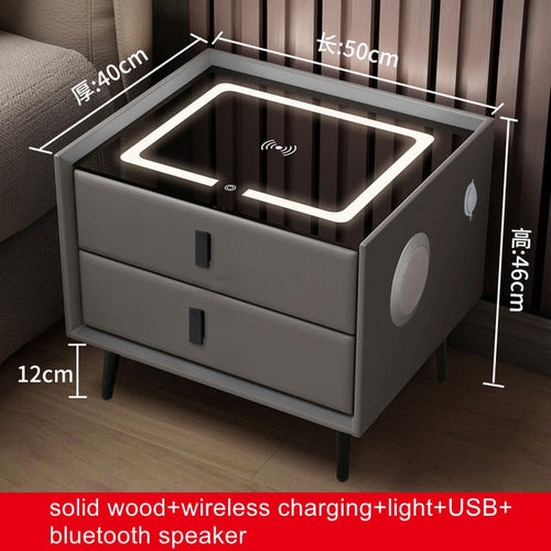 Smart bedside table with Qi wireless charging, USB ports, ambient night light, and two drawers.