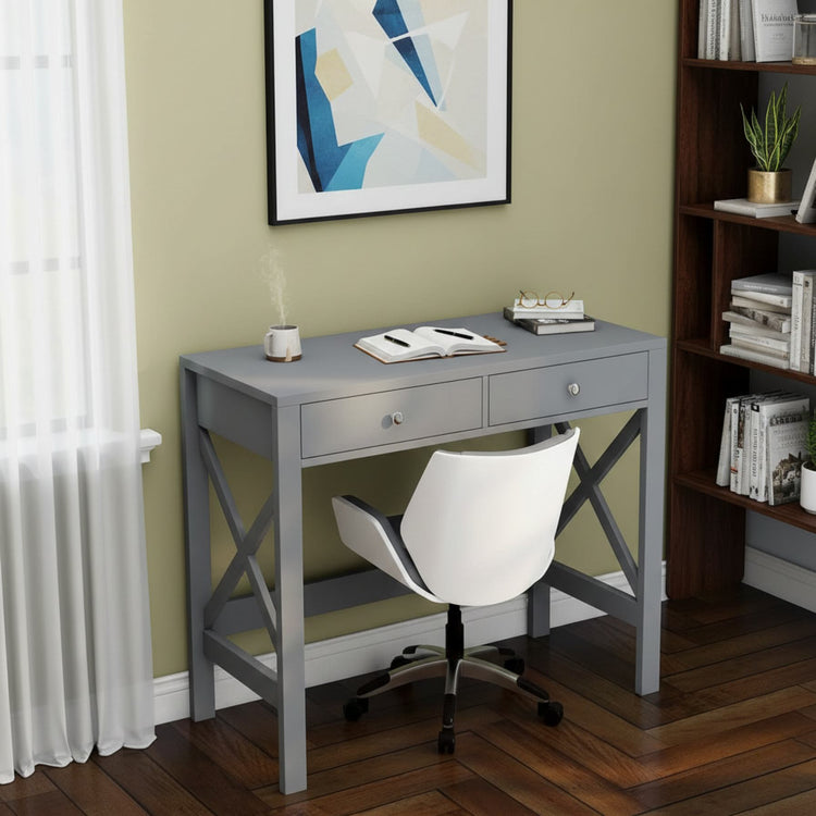 Sturdy grey home office desk with two drawers and an X-frame design, white swivel chair.