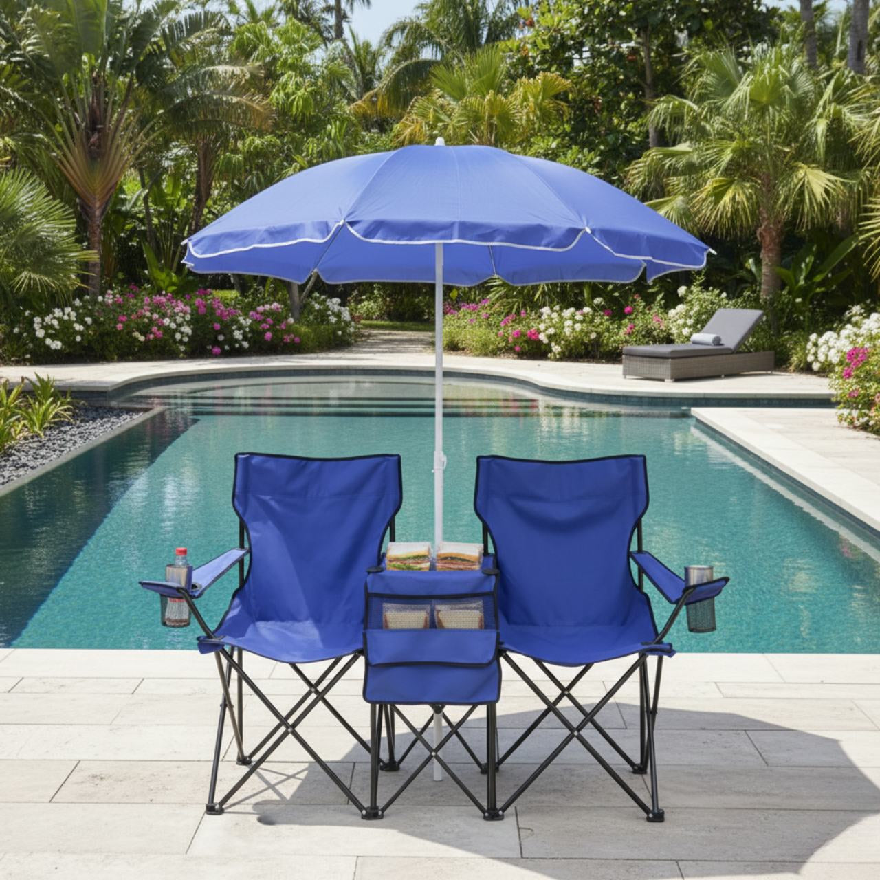 Two blue folding outdoor chairs with a central removable sun umbrella, poolside shade.