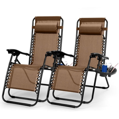 Two brown lounge chairs with black frames on a white background