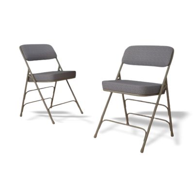 Two gray folding chairs on a white background