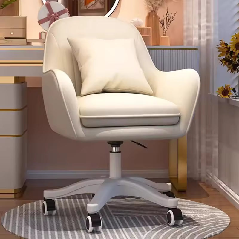 Velvet mid-back office chair with adjustable height, plush cushions, curved back, white upholstery on a wheeled base.