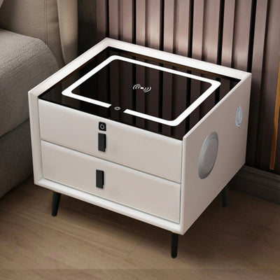 White two-drawer bedside table with glass top featuring a built-in Qi wireless charging pad.