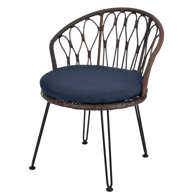 Wicker chair with a navy cushion on a transparent background