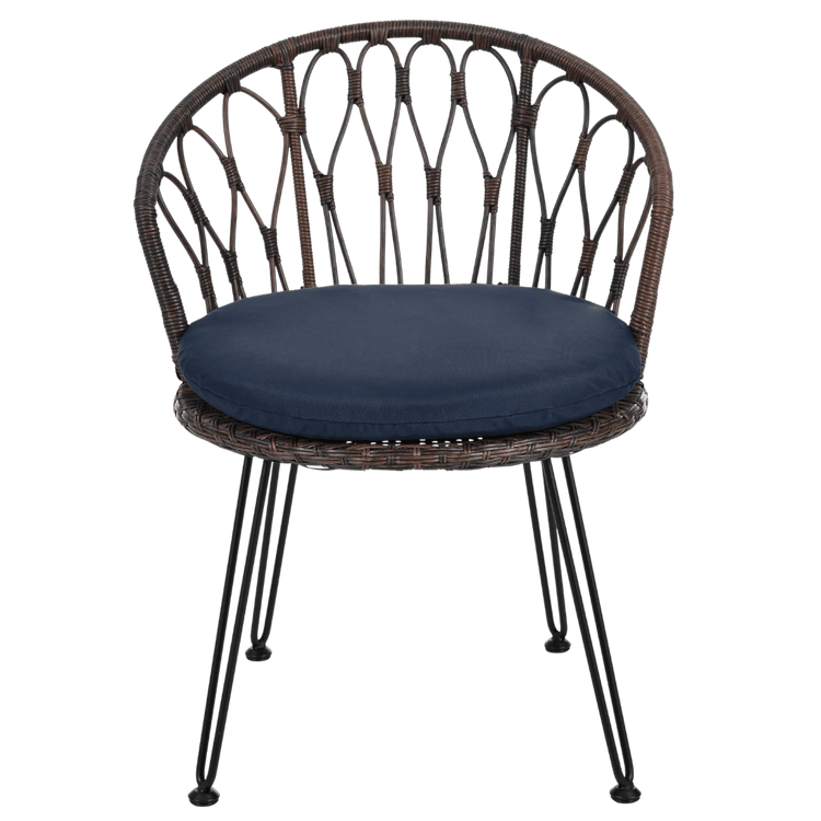 Wicker chair with a navy cushion on a transparent background