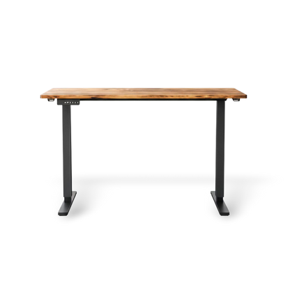 Electric height-adjustable standing desk on a #f3f3f3 studio background
