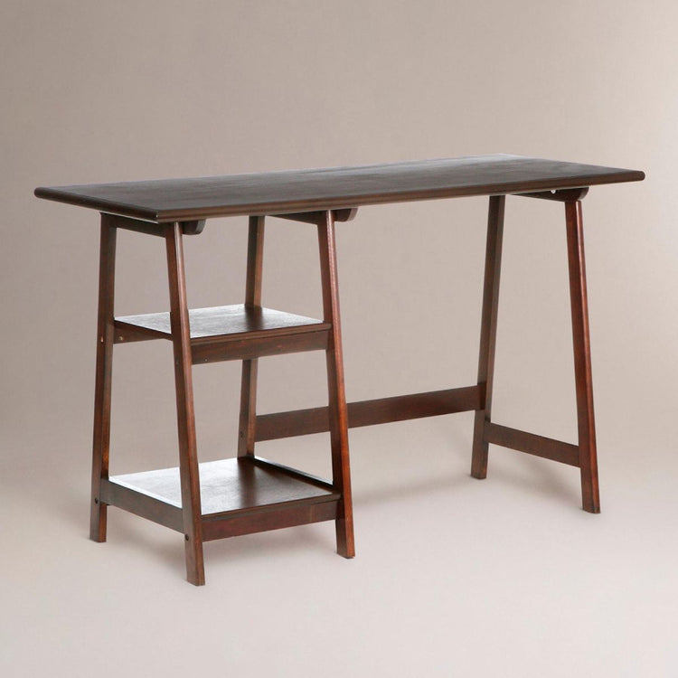 Wooden desk with a dark top on a plain background