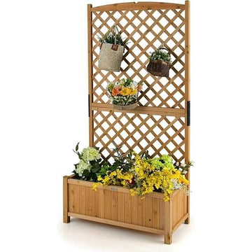 Wooden planter with lattice design and flowers on a white background