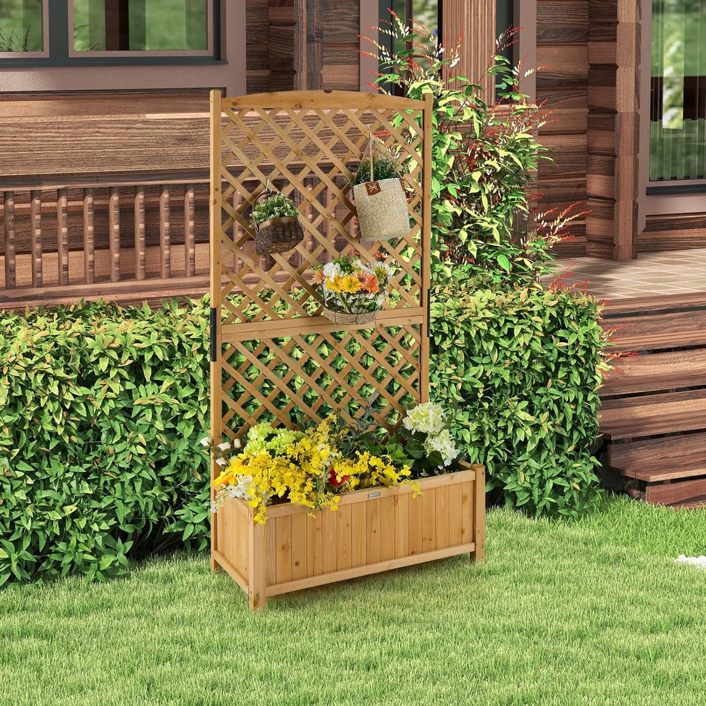 Wooden planter with lattice design filled with plants and flowers 