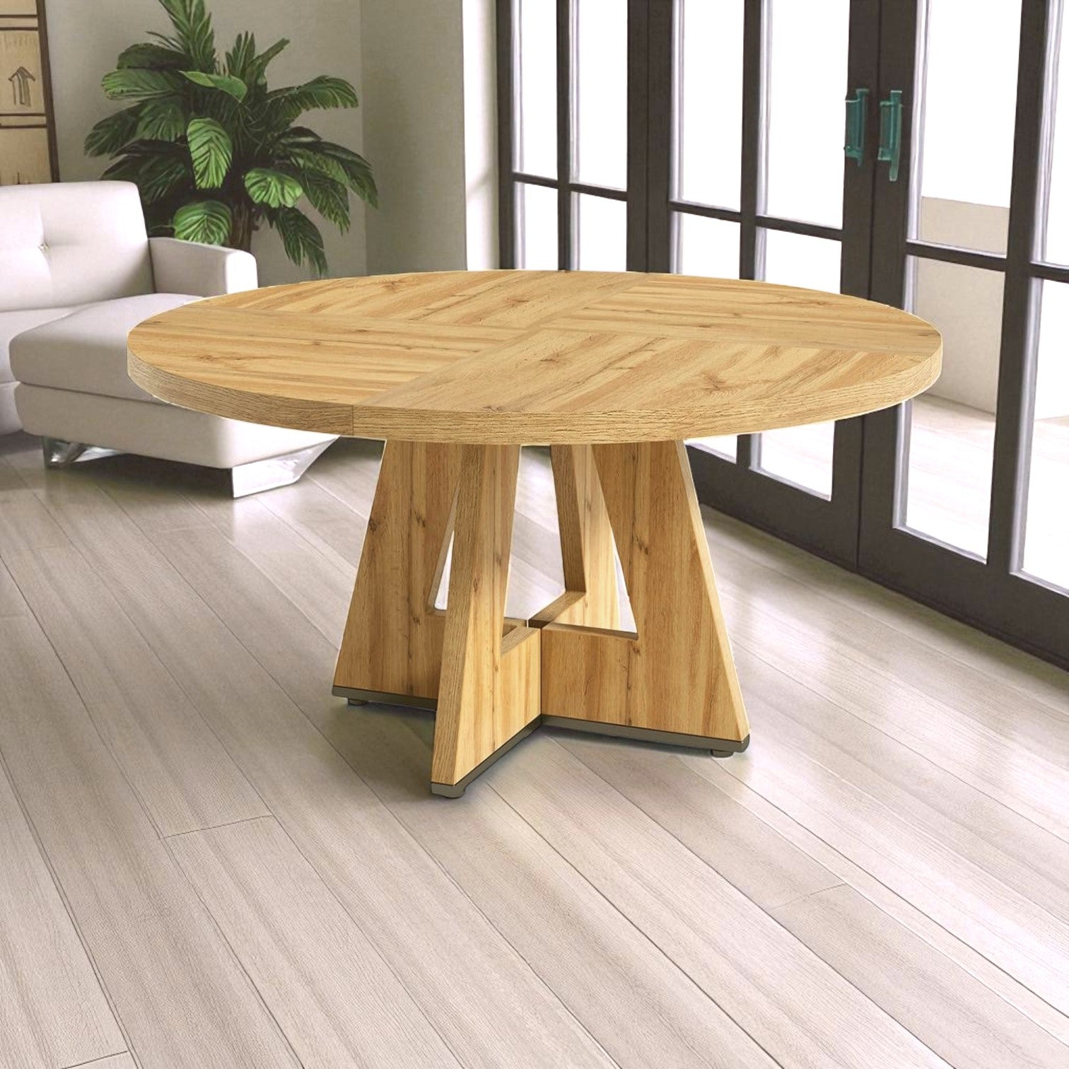 Wooden dining table in a room with a couch and large windows.