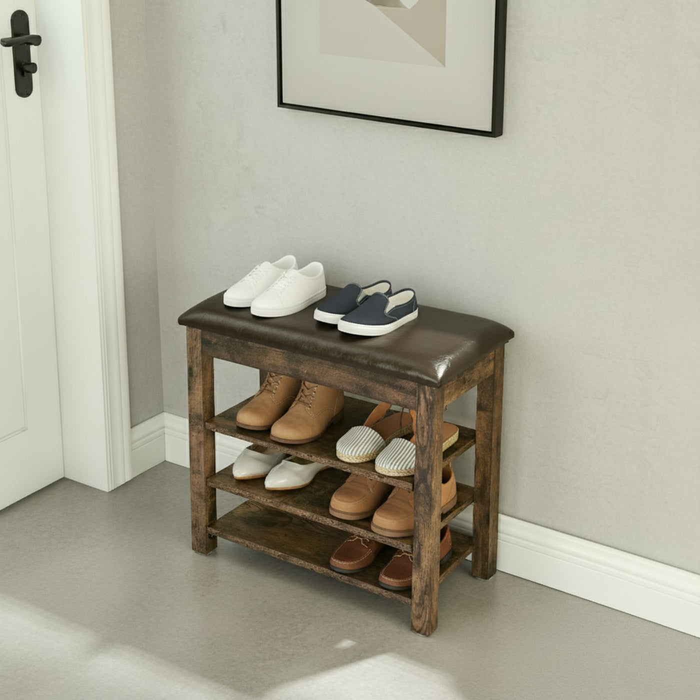 Wooden shoe rack with shoes on a gray floor next to a white wall.