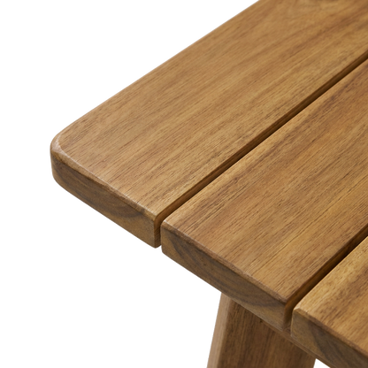 Arc-edge profile of the acacia wood bench seat, showing the sanded curved edge