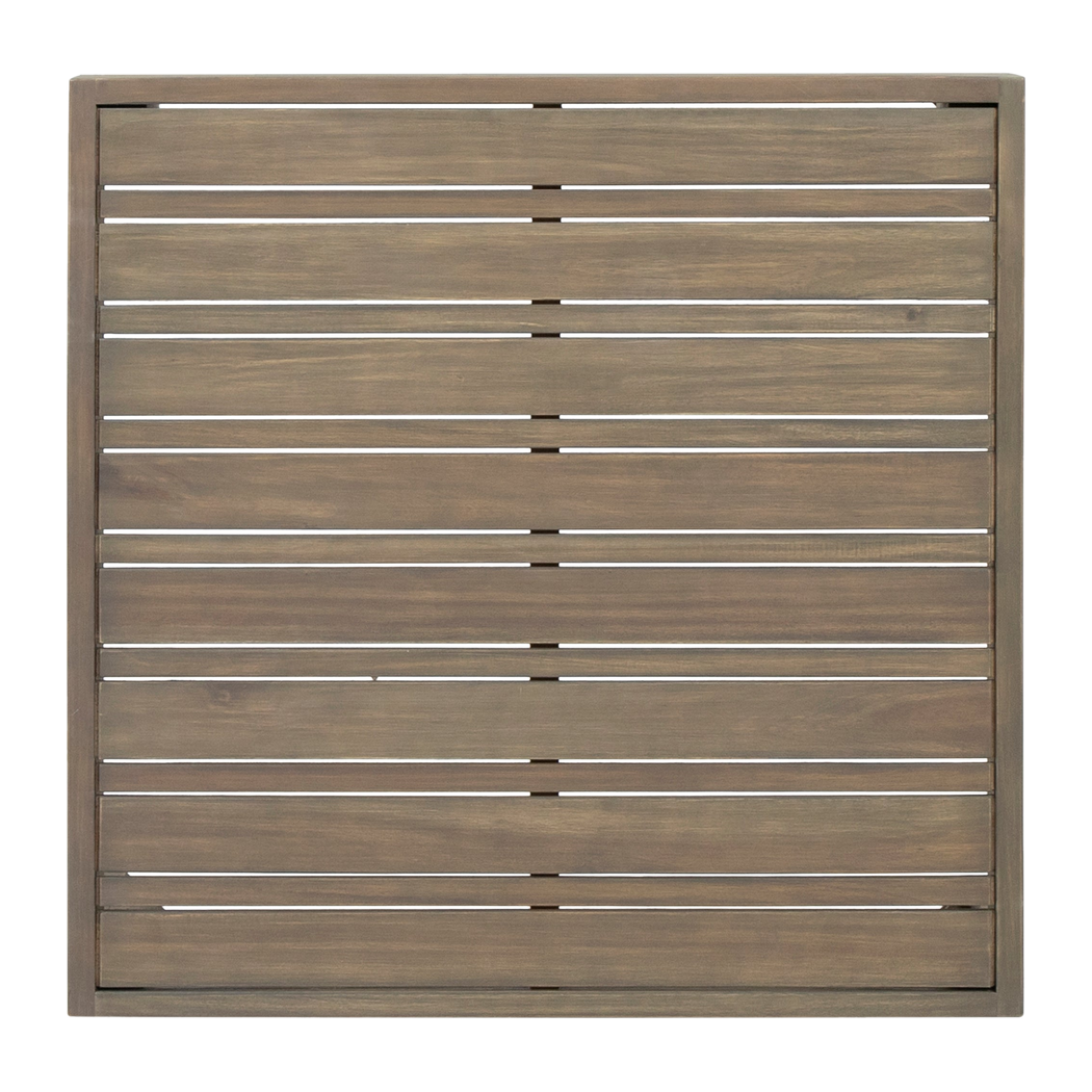 Slatted acacia coffee table top seen from above with drainage gaps between boards, close-up detail