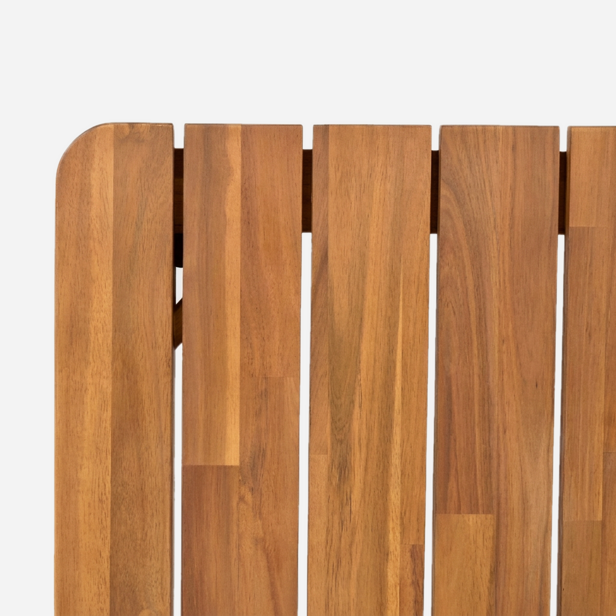 Close-up of the acacia slatted tabletop grain and the even gaps between slats
