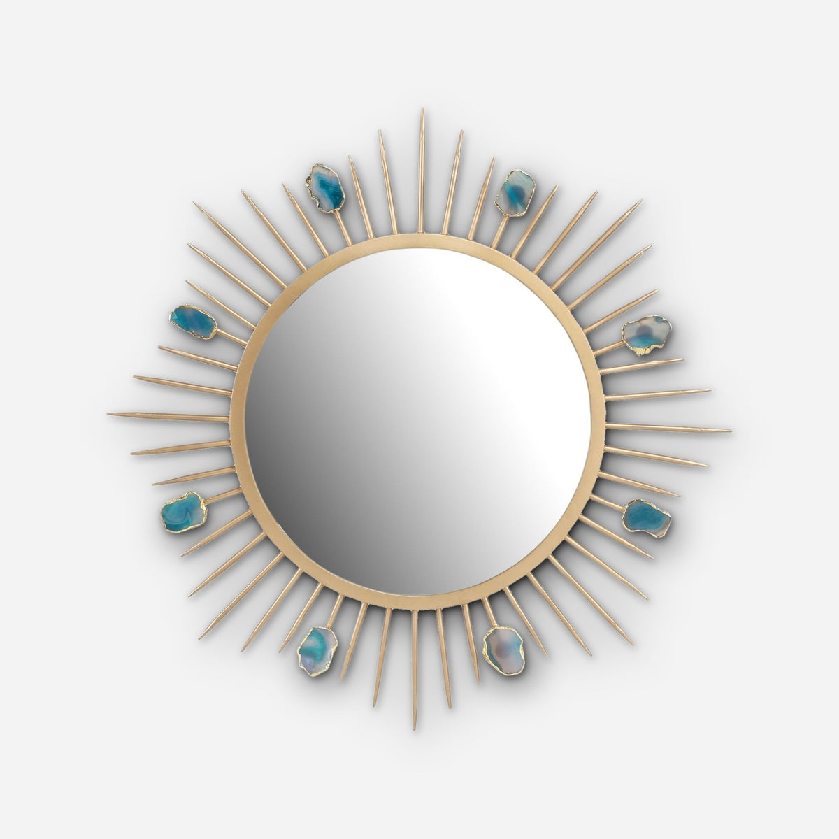 Round gold sunburst mirror with tapered rays and teal agate slices, front view