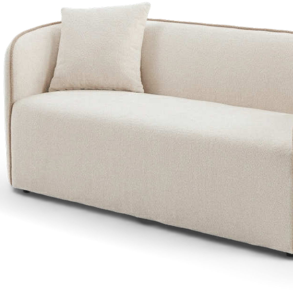 Curved arm with tan piping and corner pillow (close-up detail, transparent)