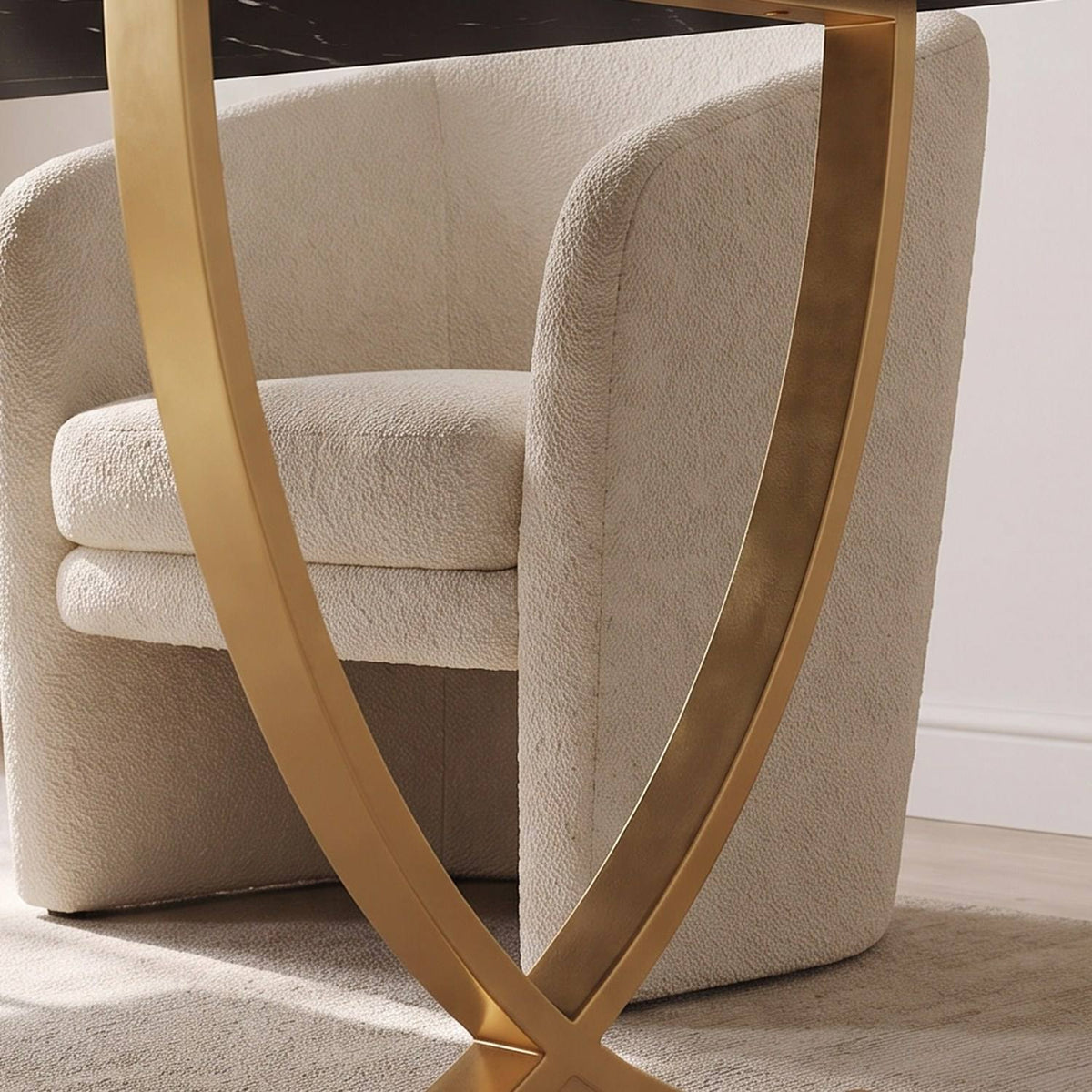 Close-up of the gold crossed leg beside the chair in the study