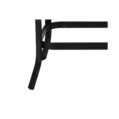 Close-up of the black metal outdoor coffee table's leg and stretcher joint