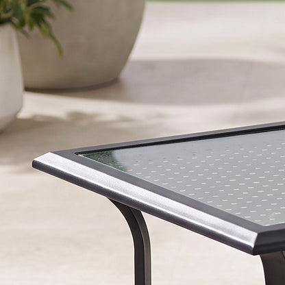 Close-up detail of the tabletop corner on a patio