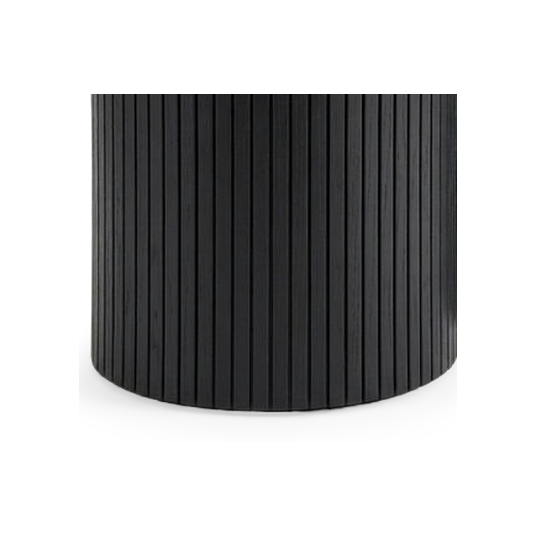 Fluted rib wall and base curve of the smaller nesting drum (close-up detail)