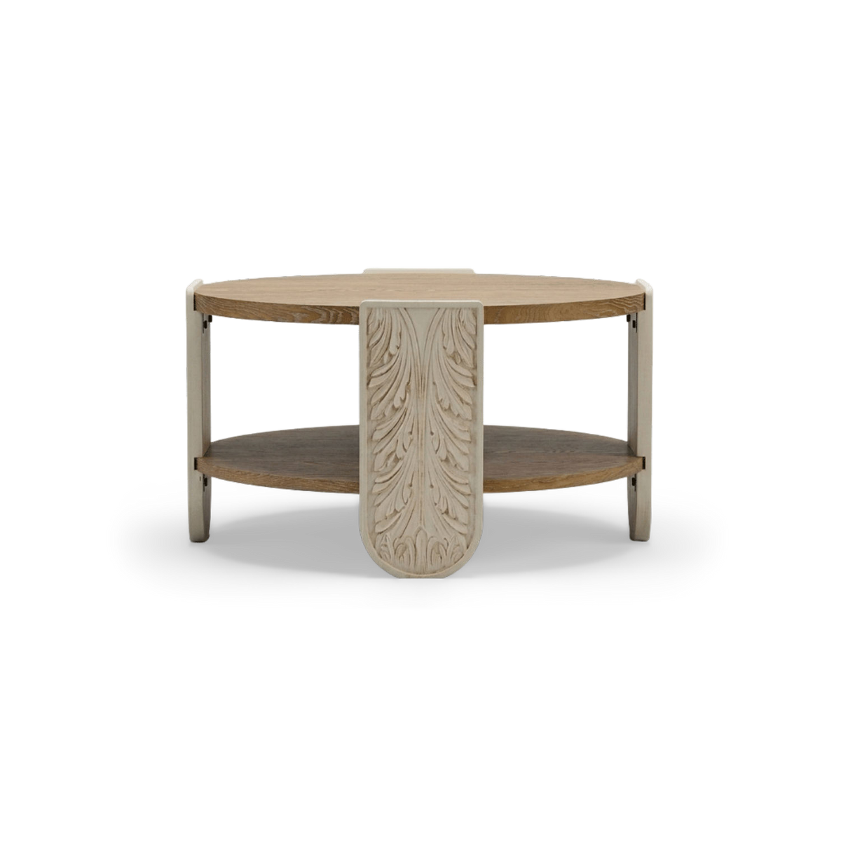 Round carved wood coffee table with oak top, lower shelf and cream carved legs, front view