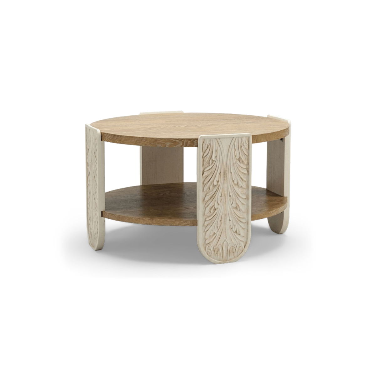 Round two-tier carved wood coffee table with cream carved leg panels and oak top, shown at an angle