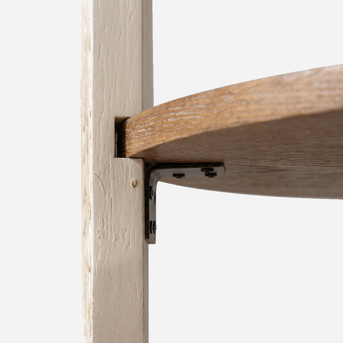 Close-up of the dark metal bracket joining the lower shelf to the leg