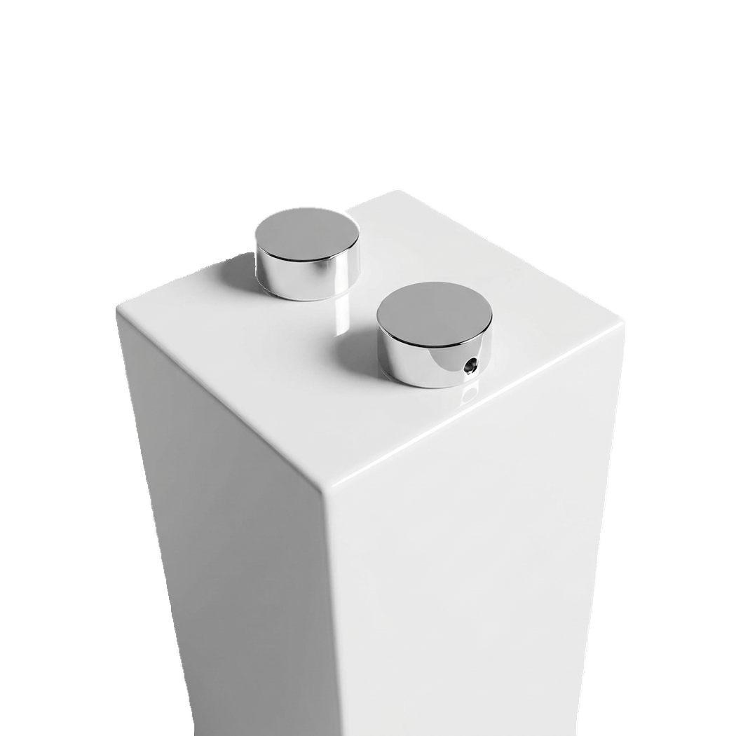 Close-up of two chrome suction pads on the white high-gloss pillar top that hold the glass