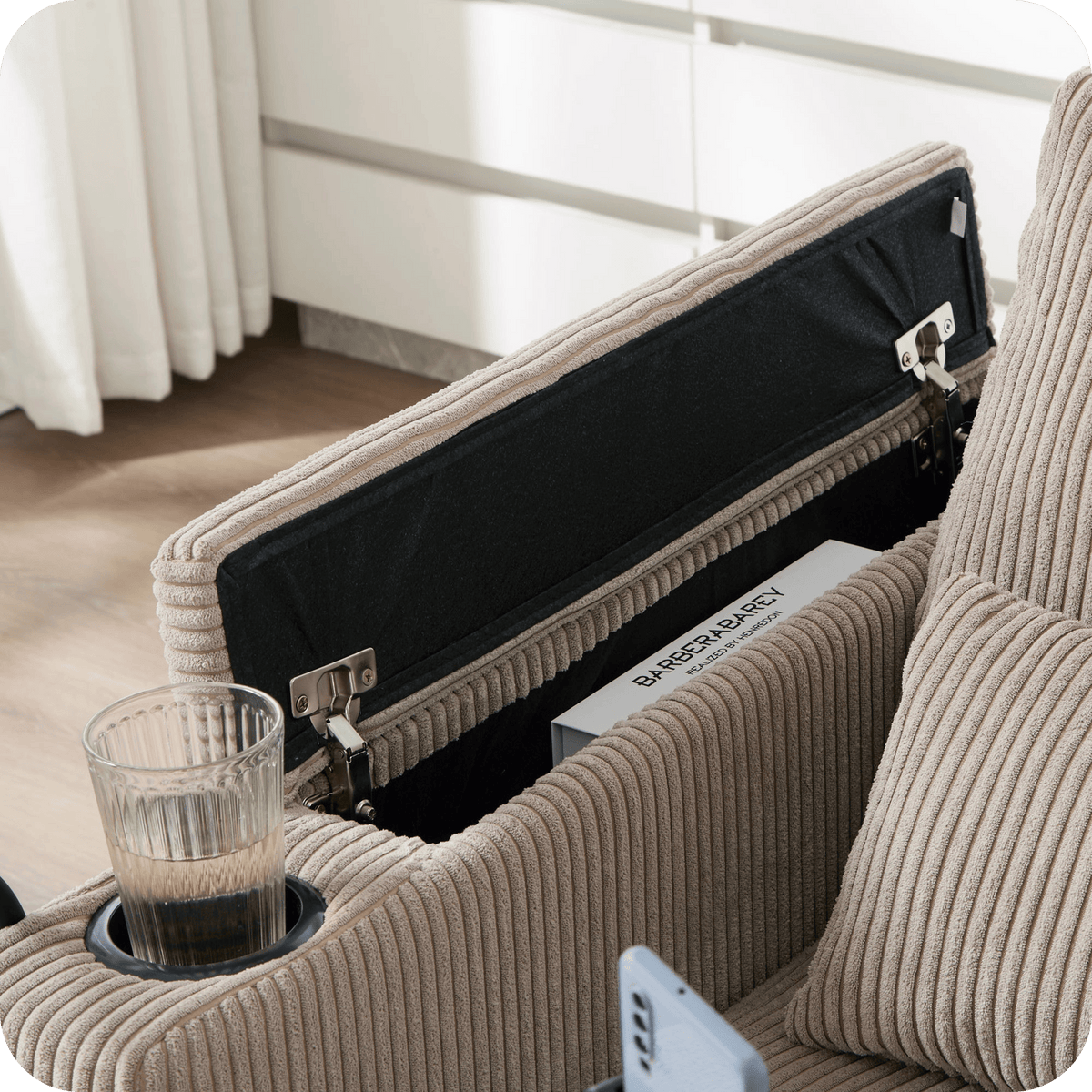 Lift-up armrest storage compartment of the corduroy chaise lounge chair (close-up detail)