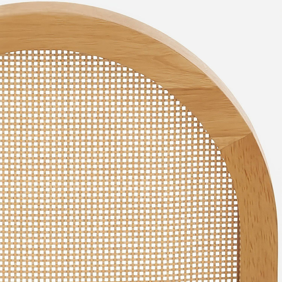 Close-up of the solid wood arch joining the side rails of the chair back