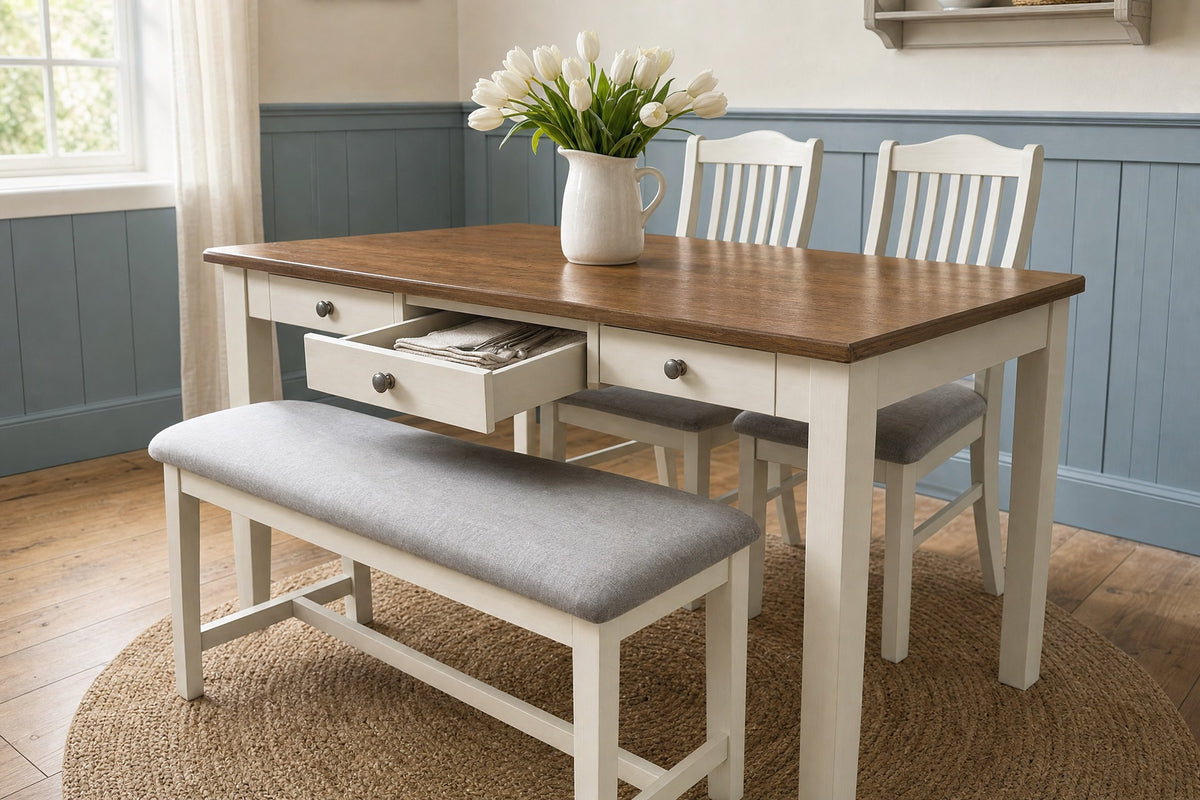 Table set with the centre drawer open and the bench tucked in, in a cottage dining room