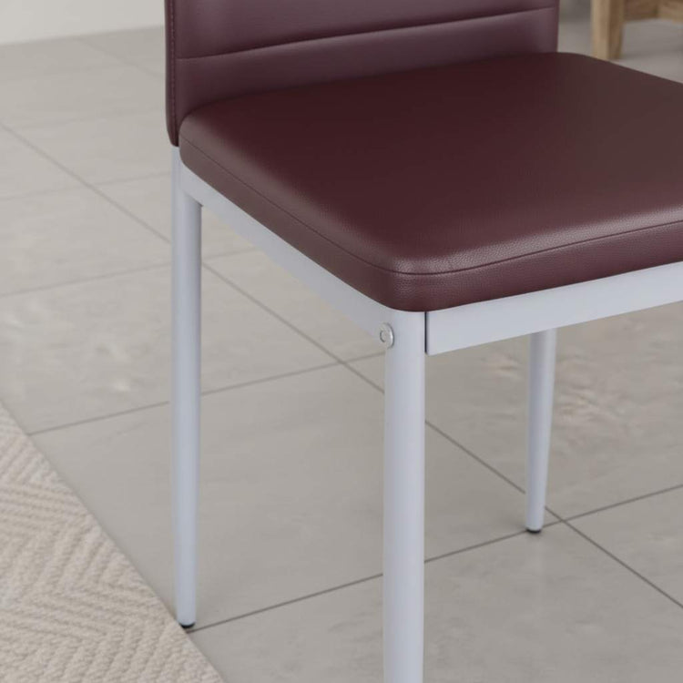 Set of four modern dining chairs with brown PVC seats, high backs, and white metal legs.