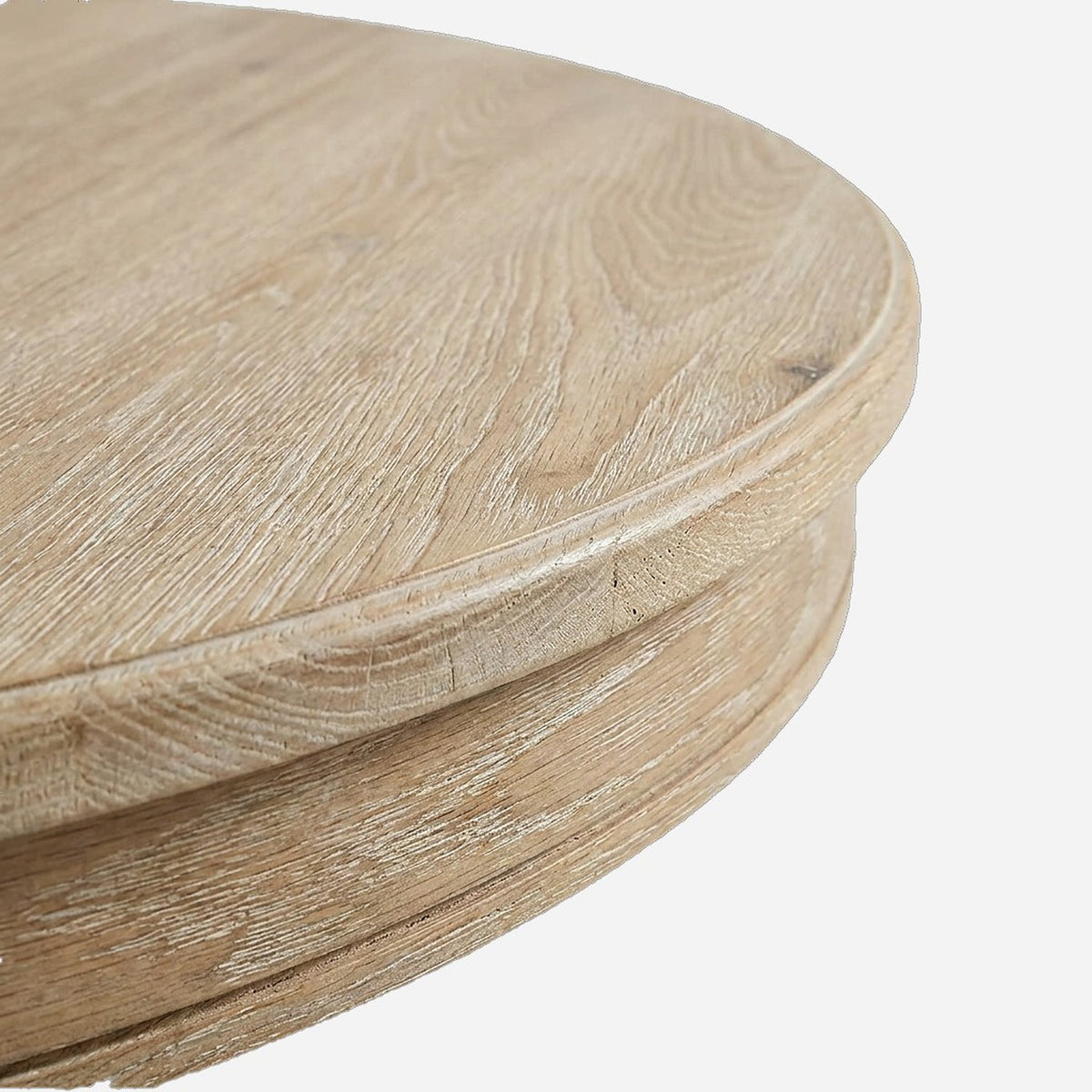Eased edge and wood grain on the round tabletop (close-up detail)