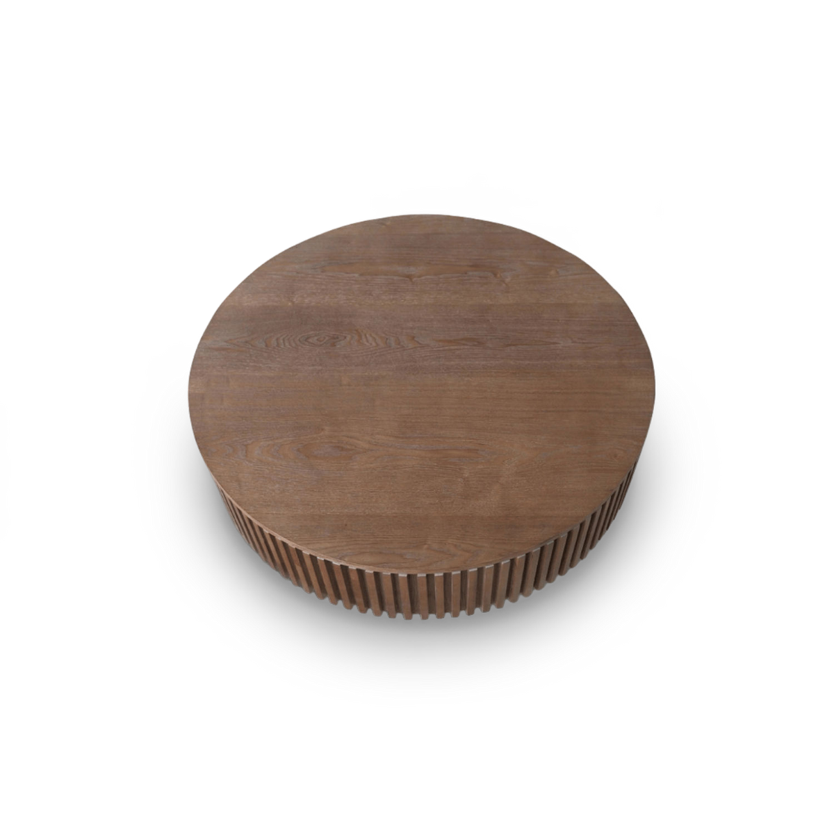 Fluted round coffee table in walnut seen from above at an angle, open-grain top and slatted band