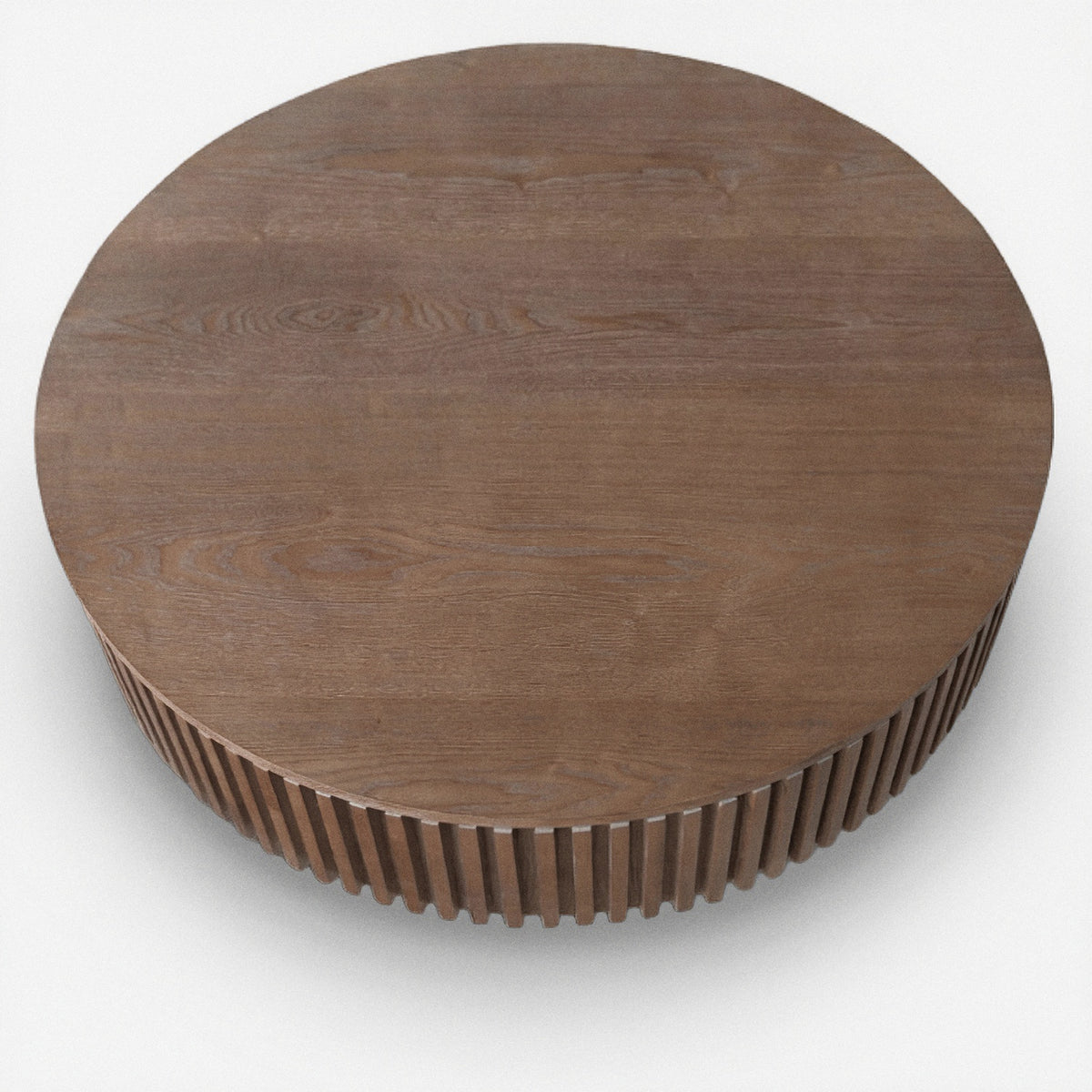 Open walnut grain and knots across the round tabletop (close-up detail)