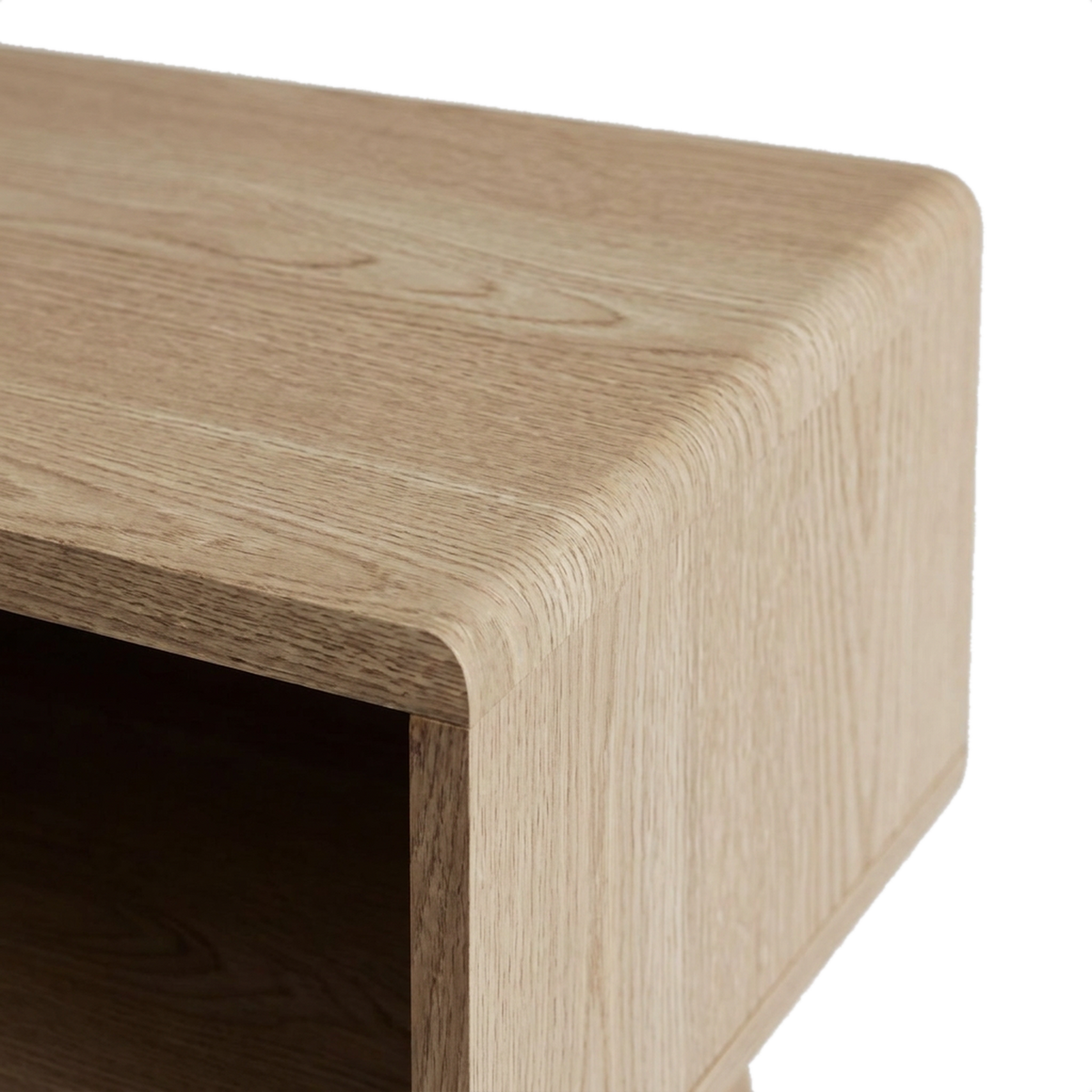 One continuous curved corner where the oak top bends into the side panel (close-up detail)